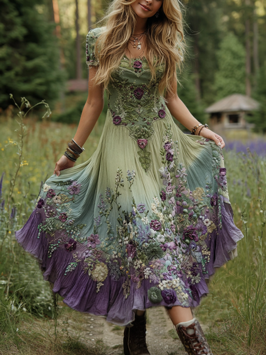 Robe longue élégante en lin, brodée de motifs floraux et d'un dégradé de violet lavande.