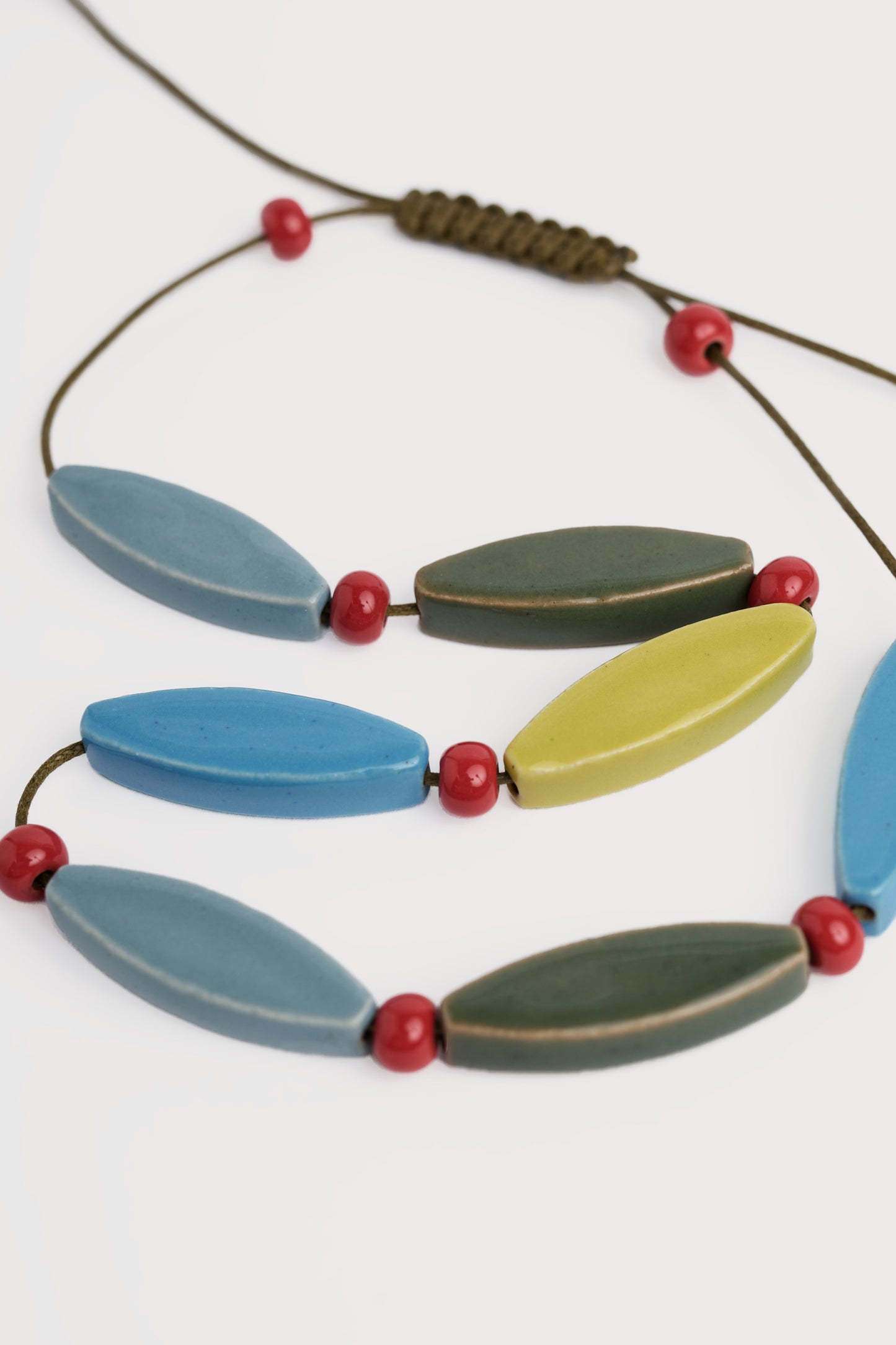 Collier de perles en céramique Care